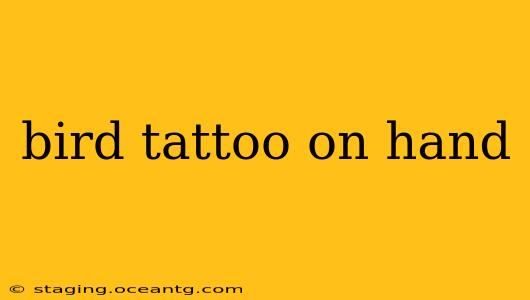 bird tattoo on hand