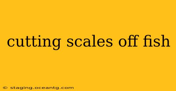 cutting scales off fish