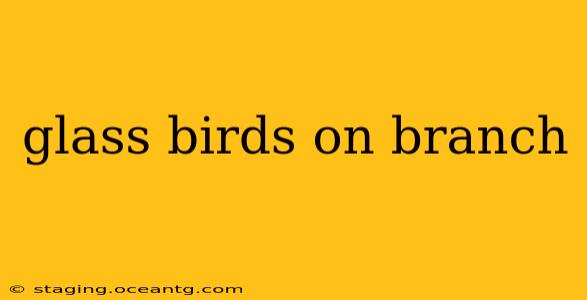 glass birds on branch