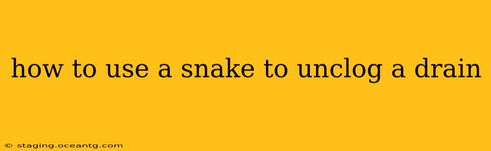 how to use a snake to unclog a drain