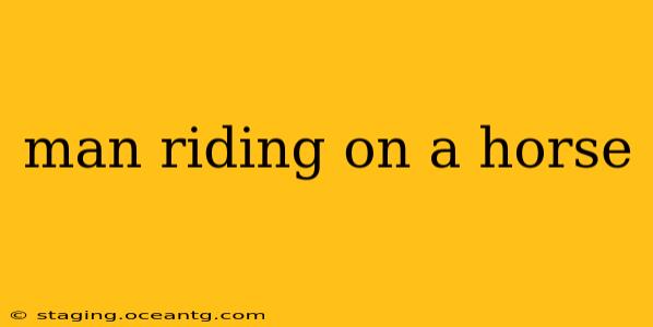 man riding on a horse
