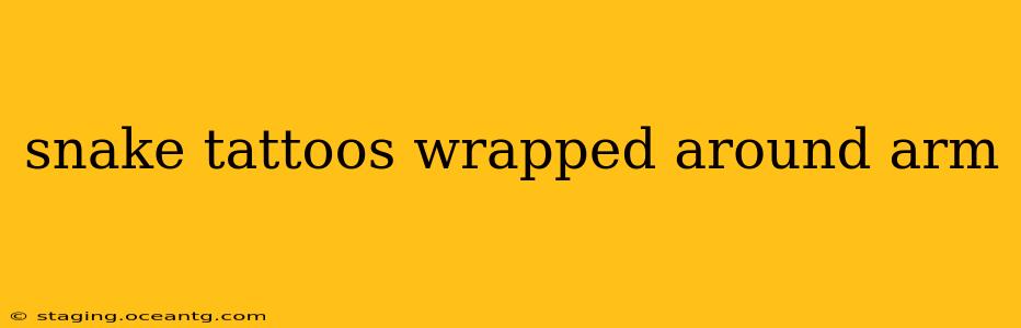 snake tattoos wrapped around arm